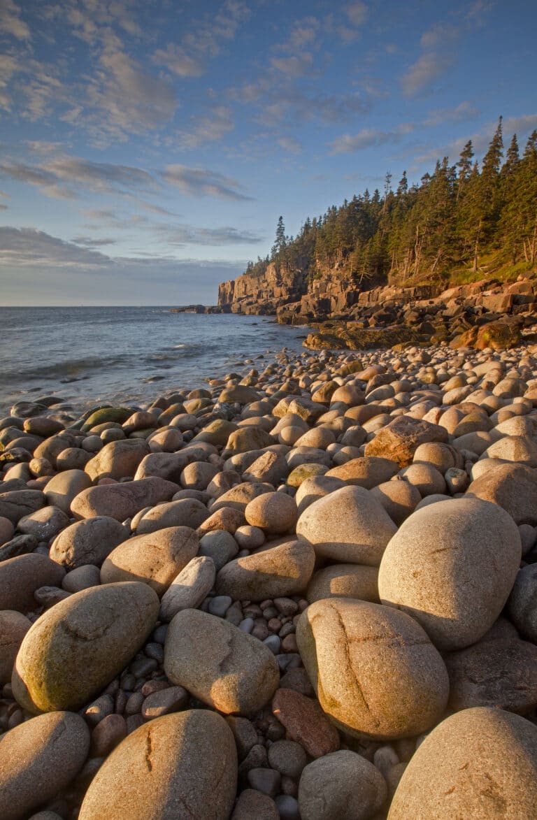 A beach strewn with large rocks