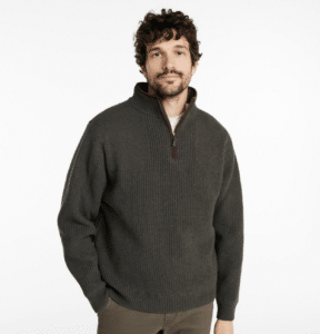 Man with dark hair smiling wearing the L.L.Bean - Waterfowl Sweater with WINDSTOPPER by GORE-TEX LABS. 