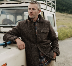 Man leaning on a truck wearing a Buffalo Jackson - Wesley Wool Jacket
